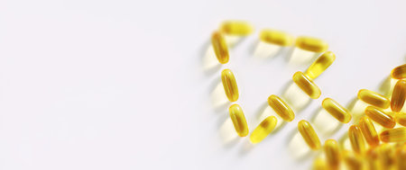 Medical medicines and supplements transparent capsules of yellow color