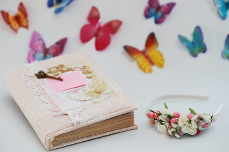 Women's secrets, a diary for entries on a white table and accessories