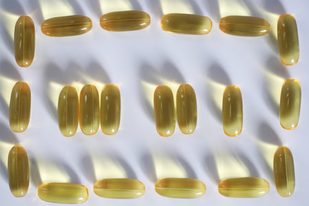 Medical medicines and supplements transparent capsules of yellow color