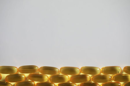 Medical medicines and supplements transparent capsules of yellow color