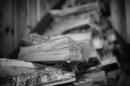 Wood burning stove. Firewood for furnace heating. Warehouse for firewood for stove.の写真素材