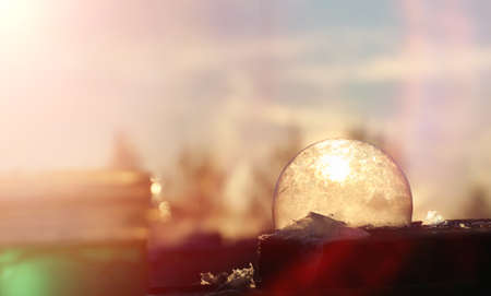 Soap bubbles freeze in the cold. Winter soapy water freezes in air.の写真素材