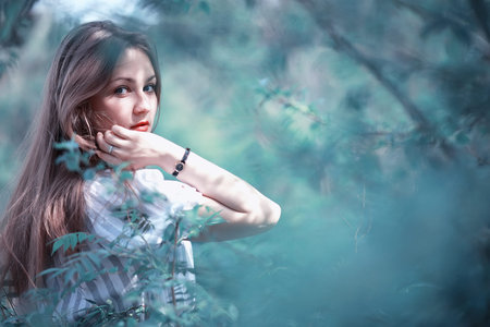 A girl in a spring green parkの写真素材