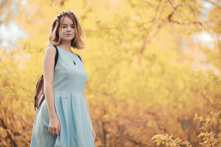 Young girl on a walk in the autumnの写真素材