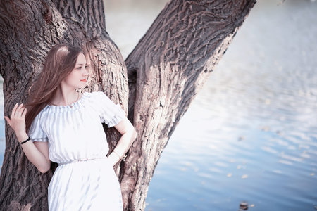 A girl in a spring green parkの写真素材