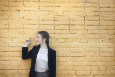 Cute girl in an autumn parkの写真素材