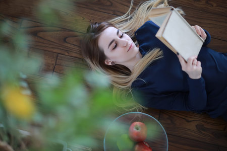 Young girl at home relaxingの写真素材