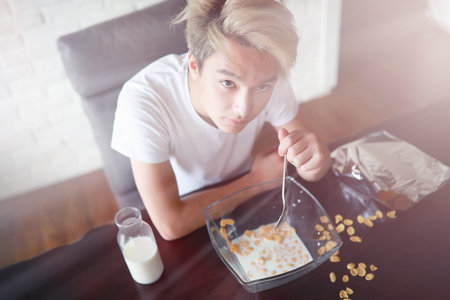 Corn flakes with milk for breakfast