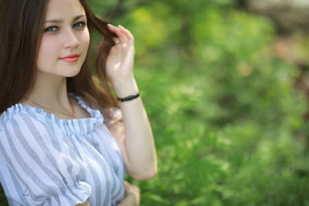 A girl in a spring green parkの写真素材