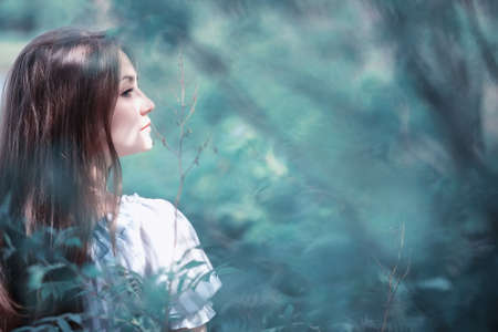 A girl in a spring green parkの写真素材