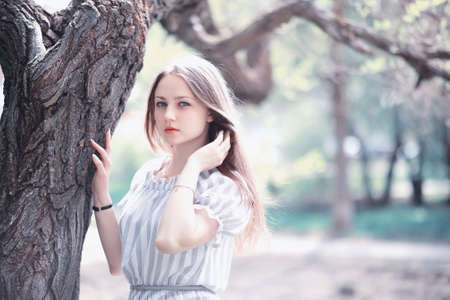 A girl in a spring green parkの写真素材