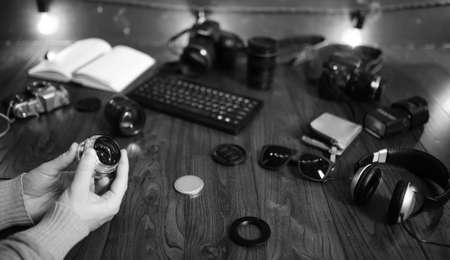The photographer's desk, digital camera accessories and lensesの写真素材