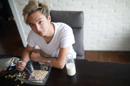 Corn flakes with milk for breakfastの写真素材