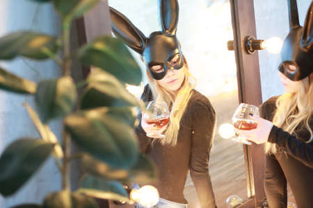 A girl in a black maskの写真素材