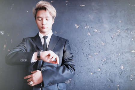 Young Asian businessman in white shirt and tieの写真素材
