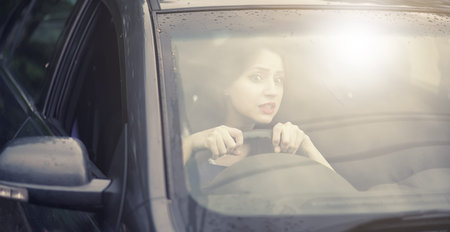 Girl driving a car bad emotions