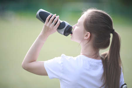 Girl and sport lifestyle doing exercisesの写真素材