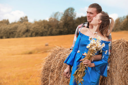 Couple on a walk in the country fields