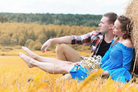 Couple on a walk in the country fieldsの写真素材