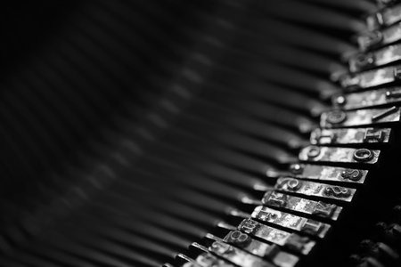 Different small metal elements of an old typewriter