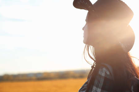 A young girl is traveling around the city hitchhiking. A beautifの写真素材