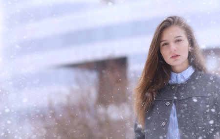 Young girl outdoors in winter.