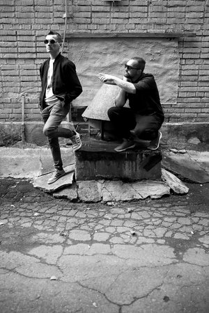 Two men in the street black and white