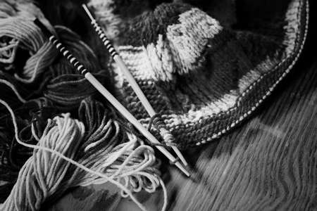 monochrome wool and knitting needlesの写真素材
