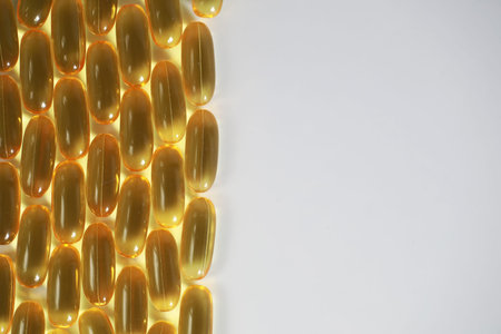 Medical medicines and supplements transparent capsules of yellow color