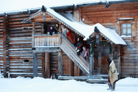 young girls in traditional costumes of the Russian north in winterの写真素材