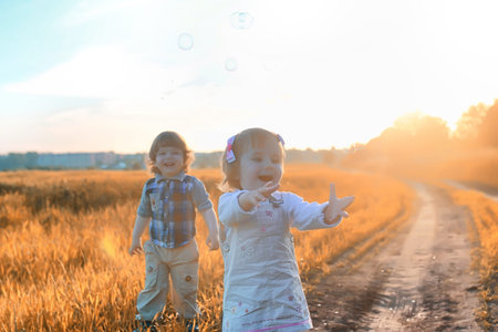 Children outdoors in a field