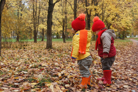 Children are walking in nature. Twilight kids are walking around