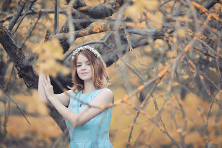 Young girl on a walk in the autumnの写真素材
