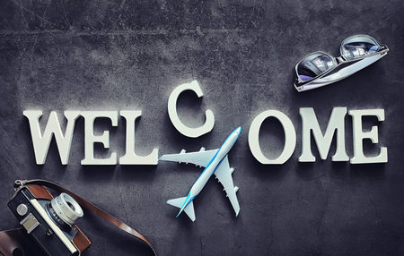 Background concept. The inscription Welcome on a dark background.の写真素材