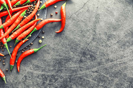 Hot red pepper. Chilean pepper on a black background.の写真素材