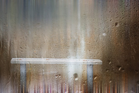 Background autumn rain in the park during the dayの写真素材