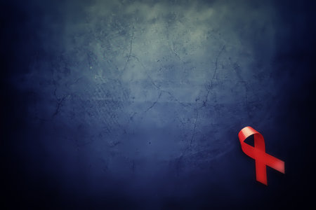 Symbol of human immunodeficiency virus disease. Red ribbon. A helping hand and support. Background.の写真素材