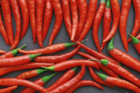 Hot red pepper. Chilean pepper on a black background.の写真素材