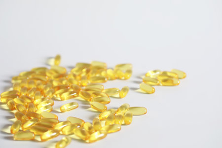 Medical medicines and supplements transparent capsules of yellow colorの写真素材