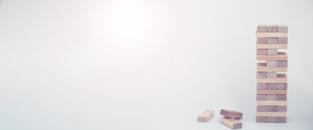 Board game brick tower of light wood sticksの写真素材