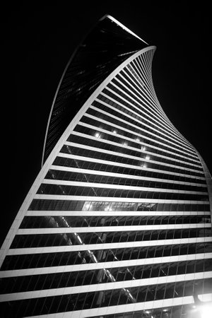 Business center in a large city with high skyscrapers in the eveningの写真素材