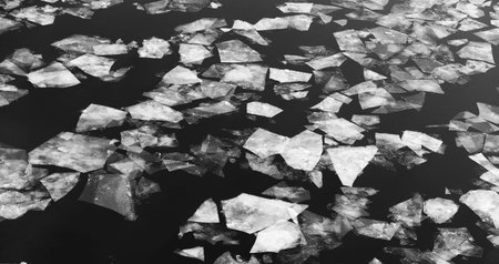 Drifting on the river. Fragments of ice float on the river.