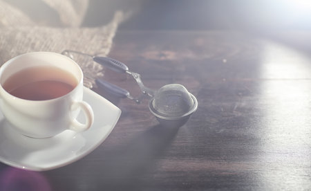 Brewed tea on a serving table with brewingの写真素材