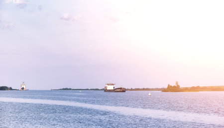Landscape lake. Texture of water. The lake is at dawn. The mouth of the river at the confluence of lake.の写真素材