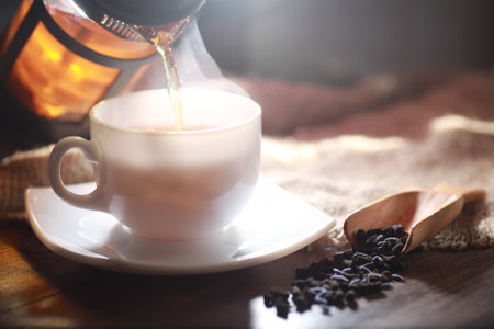 Brewed tea on a serving table with brewingの写真素材