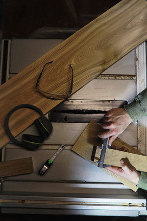 workshop with tools and electric saws in the process of manufacturing parts