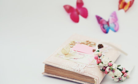 Women's secrets, a diary for entries on a white table and accessoriesの写真素材