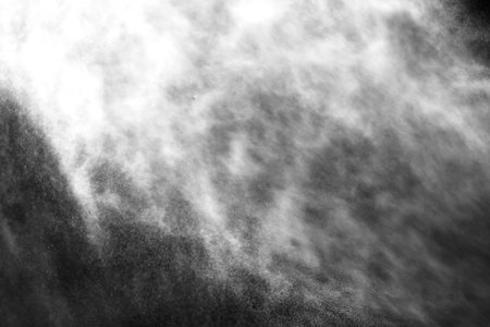 A stream of water and a cloud of drops from the atomizerの写真素材