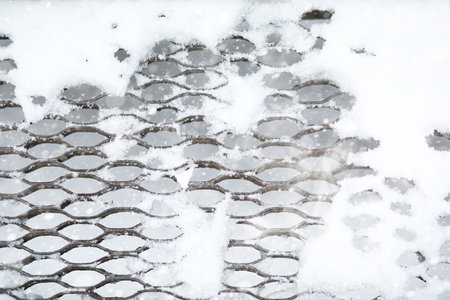 Winter landscape of country fields and roads in the snowの写真素材