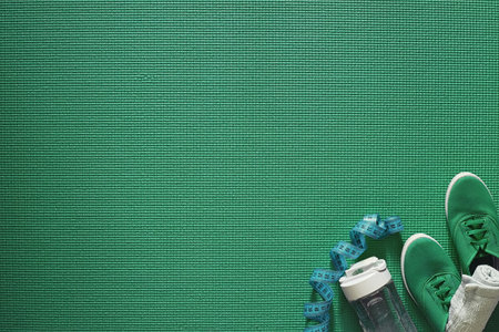 Mat for practicing yoga on a floor. Healthy lifestyle.の写真素材